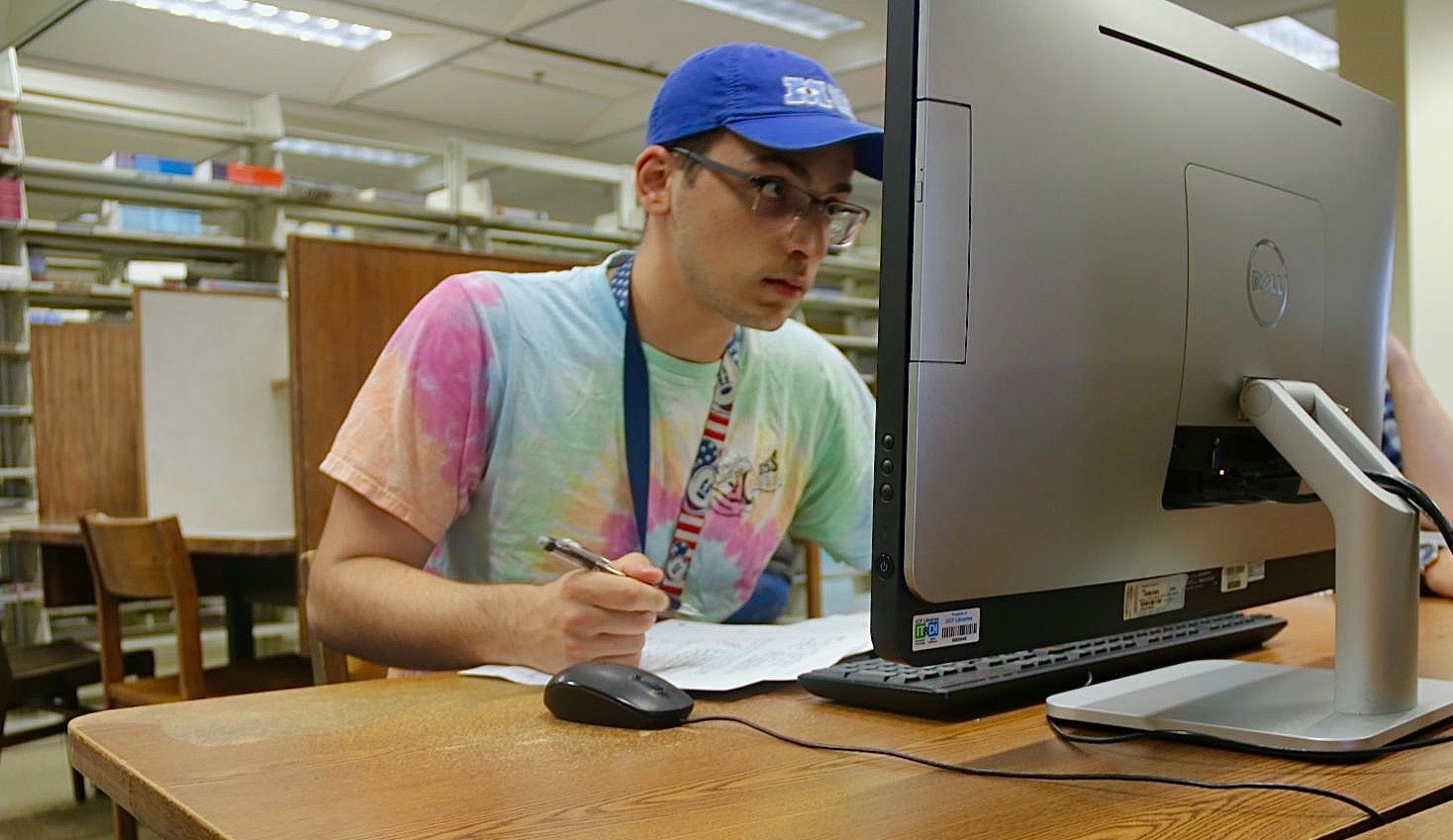 Andres Duqe studying at the library (THIS ONE)